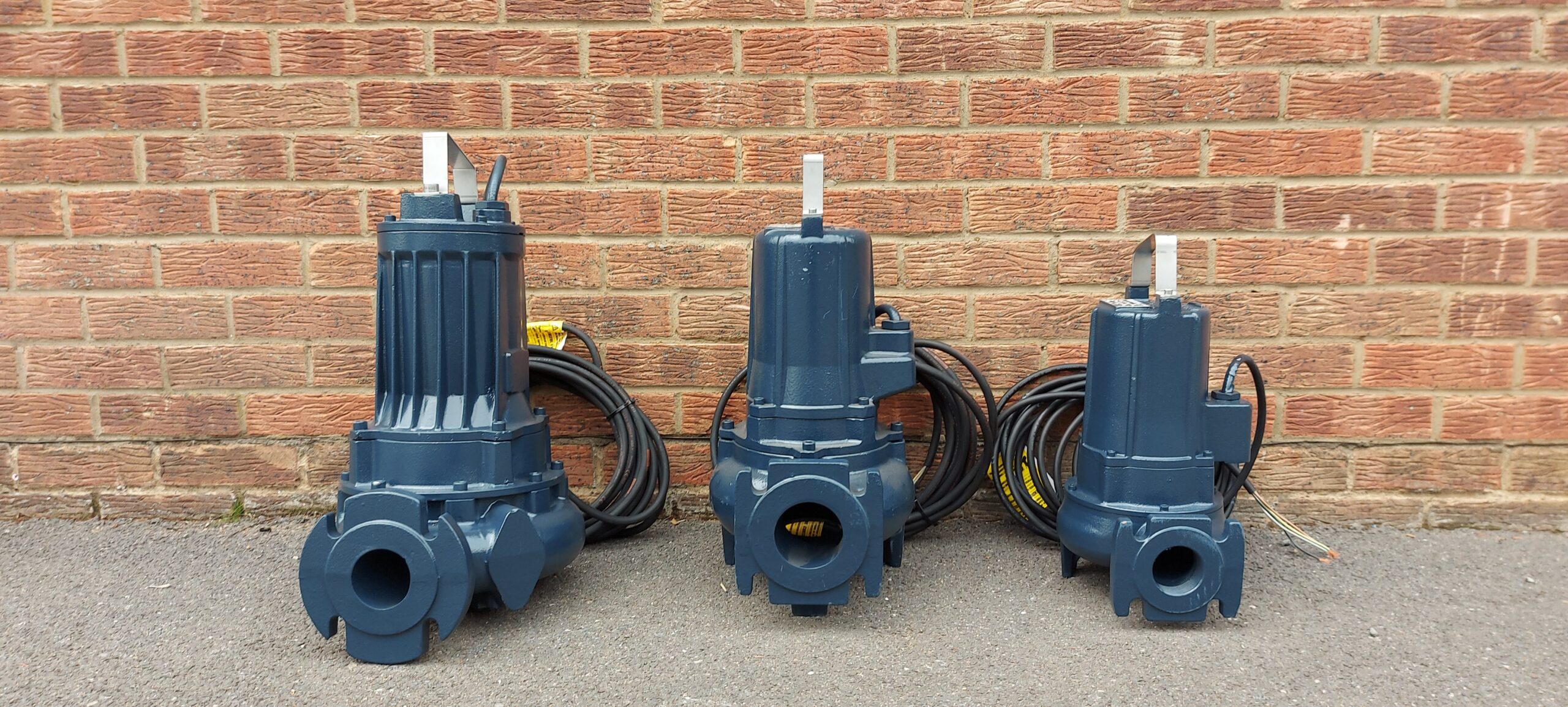 three grey Rotomec Submersible Pumps